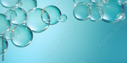 Transparent abstract soap bubbles on turquoise background 