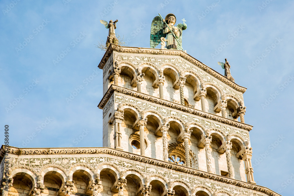 Closeup of San Michele in Foro, a Roman Catholic basilica located in Lucca, Tuscany, Italy. The church is built in Romanesque style and is located in the historic center of the city.