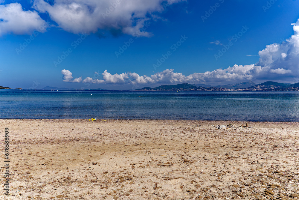 Scenic landscape with Mediterranean Sea and sandy beach of peninsula of Giens on a sunny spring day. Photo taken June 10th, 2023, Giens, France. Scenic landscape with Mediterranean Sea and sandy beach of peninsula of Giens on a sunny spring day. Photo taken June 10th, 2023, Giens, France.