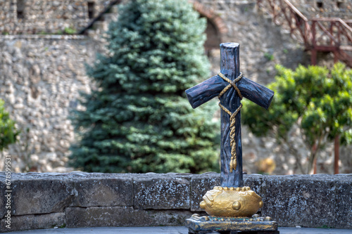 Mtskheta, Georgia. The Stone Cross At The Churchyard Of Svetitskhoveli Cathedral. photo