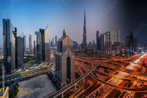Seamless day to night transition timelapse view of skyline of Downtown Dubai and busy Sheikh Zayed road intersection  United Arab Emirates