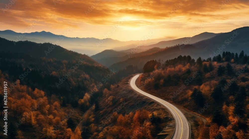Road with beautiful forest landscape,Aerial view of mountain road in forest at sunset in autumn. drone view