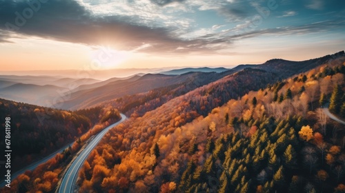 Road with beautiful forest landscape,Aerial view of mountain road in forest at sunset in autumn. drone view