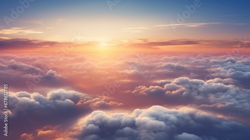 Beautiful sunset sky above clouds with dramatic light. Cabin view from airplane © CStock