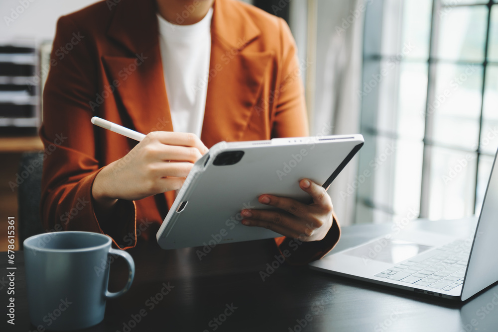 Businesswomen analyzing investment graph and discussing plan new start up project. Finance task... Businesswomen analyzing investment graph and discussing plan new start up project. Finance task...