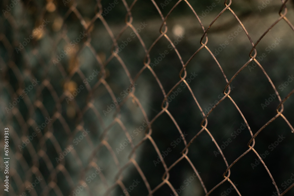 Fototapeta premium metal grid background, fence texture background, old springs on gray background in perspective