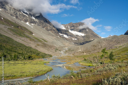 Steindalen Valley and Proglacial River on a sunny summer day, Lyngen Alps, Northern Norway photo