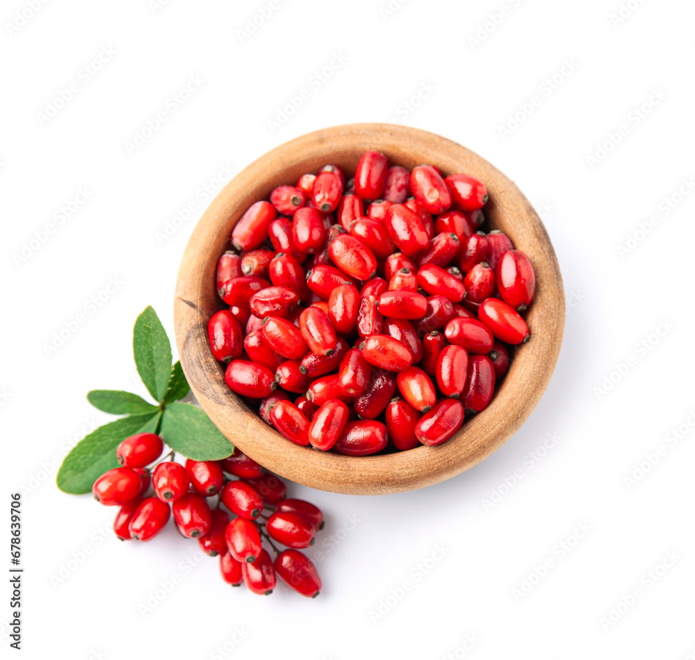 Barberries in wooden plate on white backgrounds Barberries in wooden plate on white backgrounds