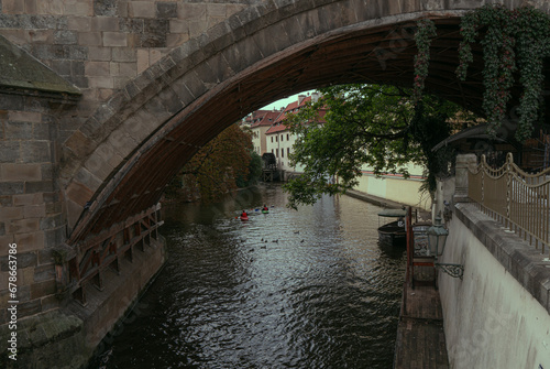 Water canal in Prague under the Karl Bridge. © Andrzej