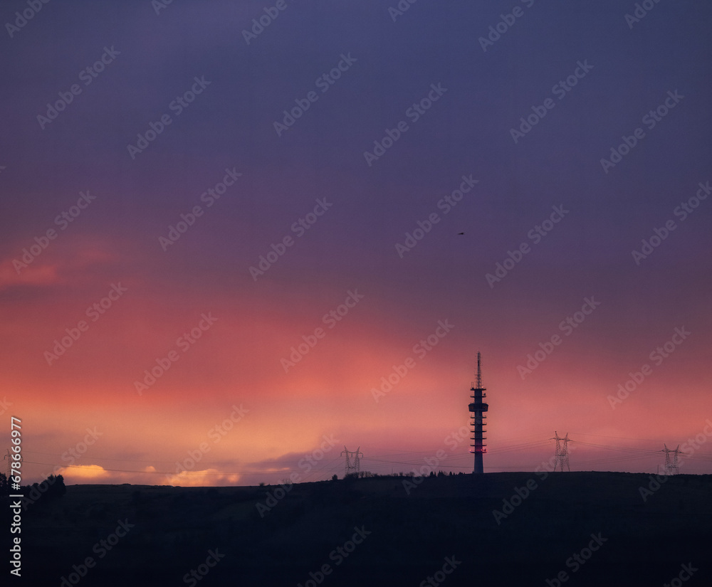 radio tower at sunset
