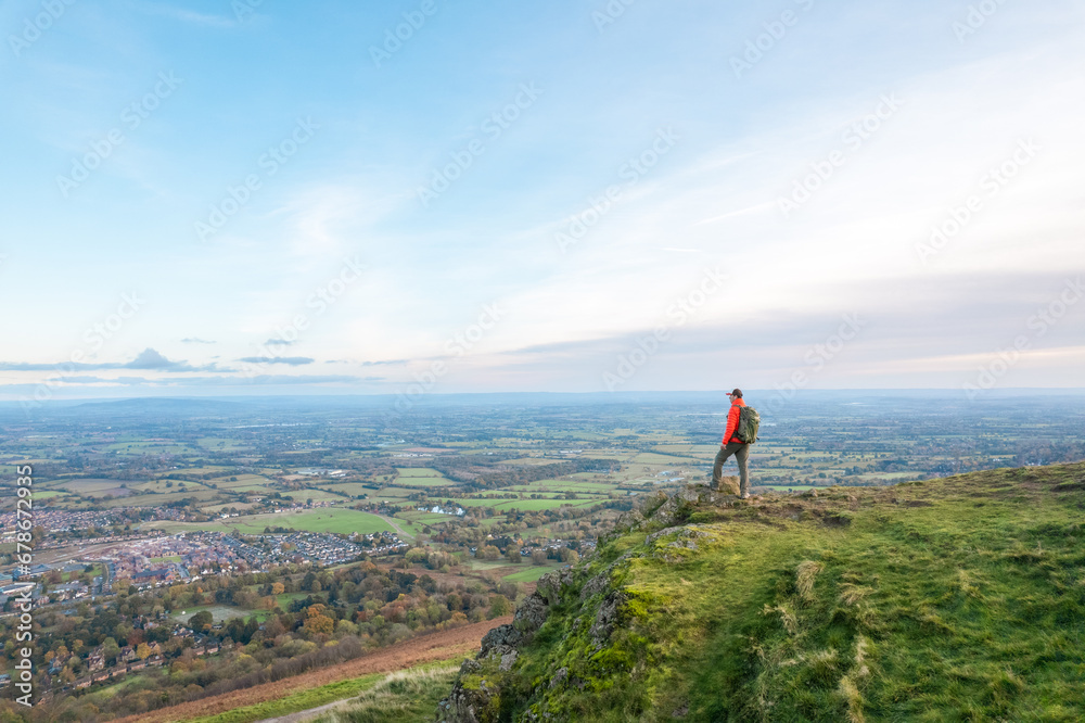 amazing view of Hiker standing of the peak the Malvern Hill of Great Malvern, Worcestershire, United Kingdom