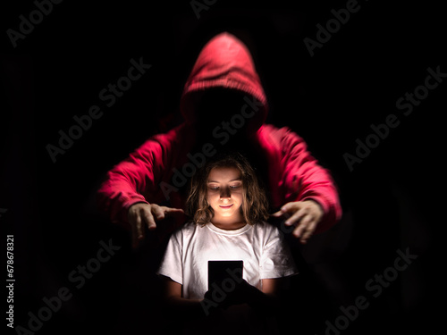 A girl using her cell phone on social networks without being aware of the dangers they can have.