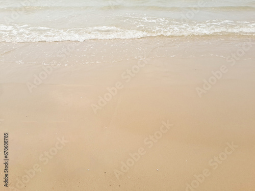 wave of sea beach on sandy shore