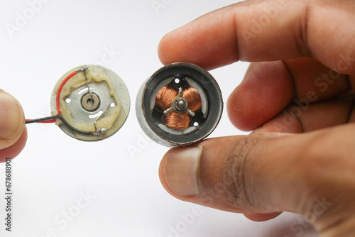 DC Motor mostly used in dvd players and drivers with its back part removed to have a view of rotor and brushes