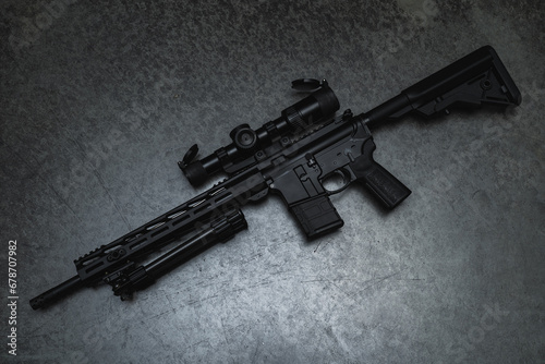 Tactical rifle ar 15 with optical sight and bipod. photo