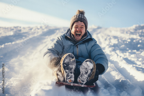 Joyful individual tobogganing down a snowy hill background with empty space for text  photo