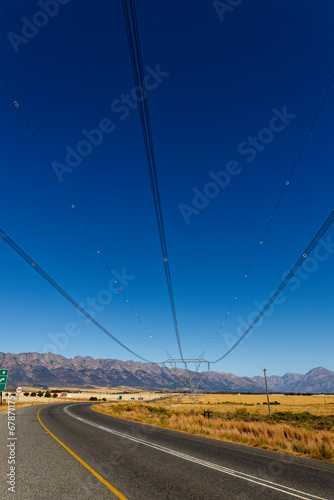 A pylon carrying high voltage cables for Eskom near Porterville in the Western Cape, South Africa. photo