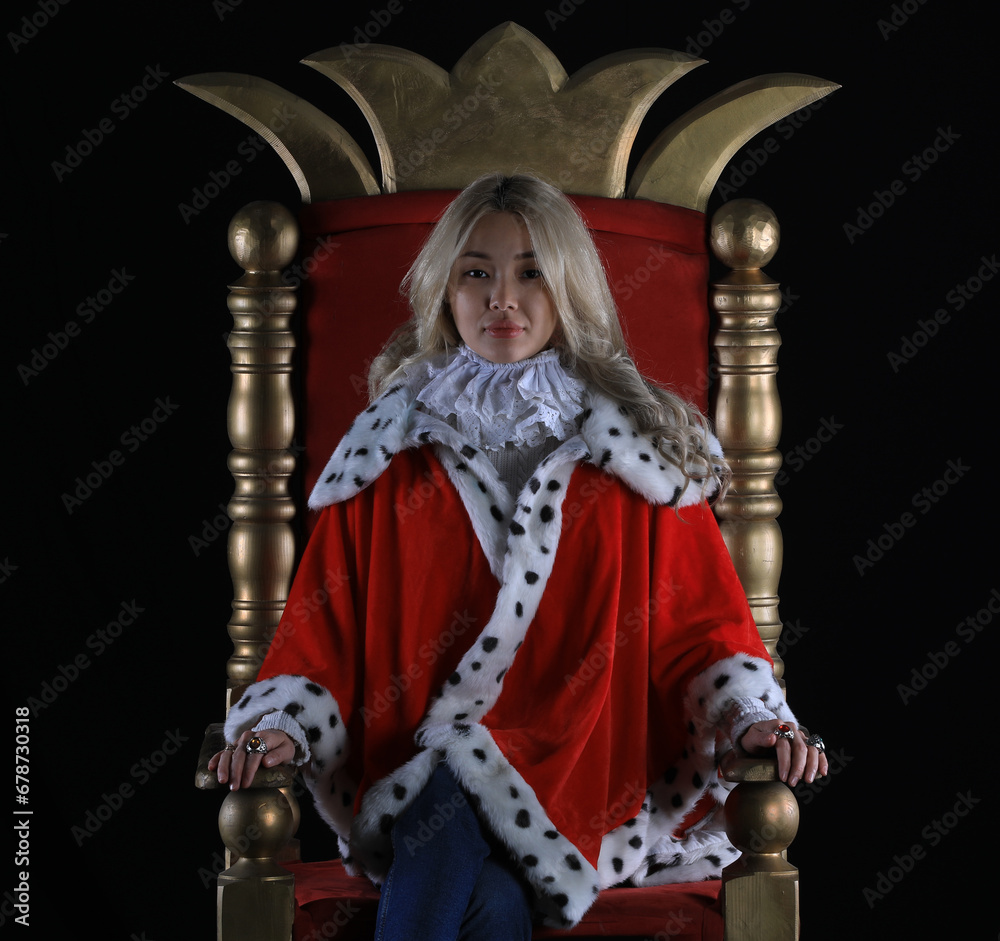 beautiful blonde queen on the throne