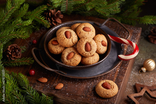 Traditional Christmas cookies with almond nuts. Delicious homemade dessert photo