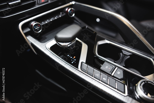 Detail of modern car interior, gear stick, automatic transmission in expensive car © Hanna