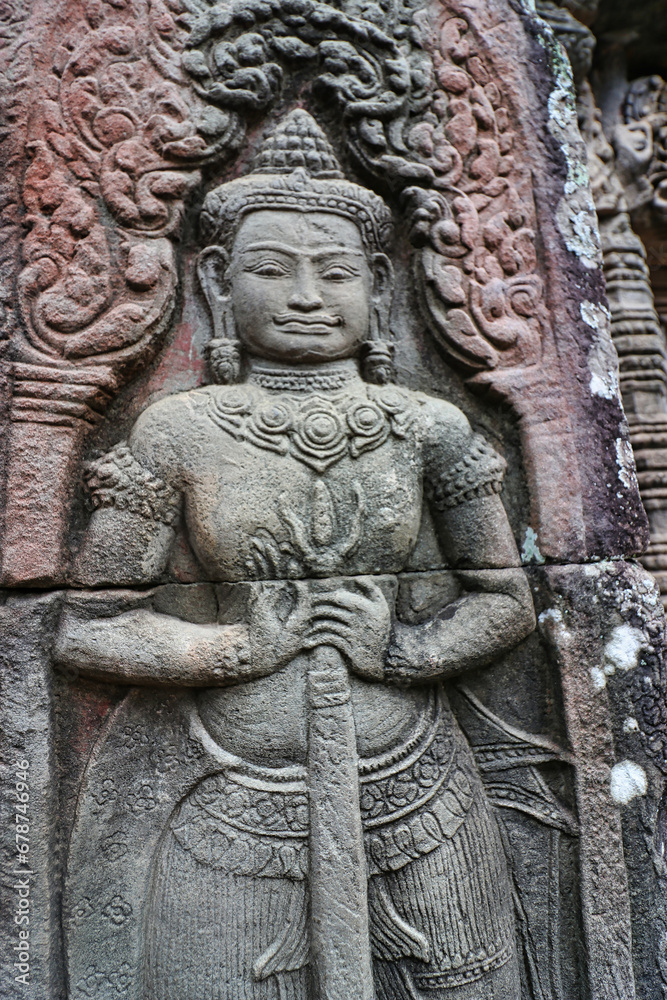A Divine Door Guardian at Banteay Kdei, Buddhist monastic temple at Siem Reap, Cambodia, Asia