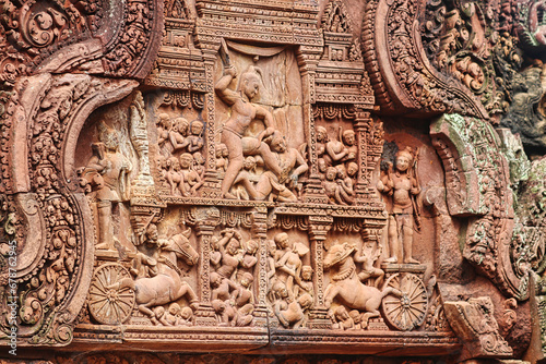 A scene from Hindu mythology at Banteay Srei Temple at Siem Reap, Cambodia, Asia