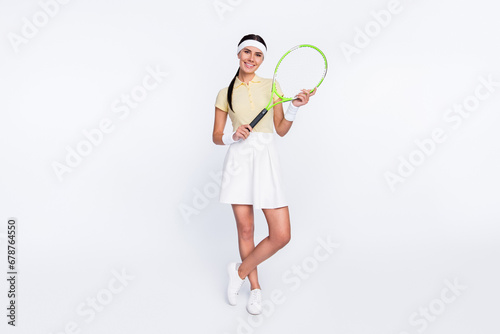 Full length body size view of attractive content cheerful girl playing national league tennis isolated over white color background © deagreez