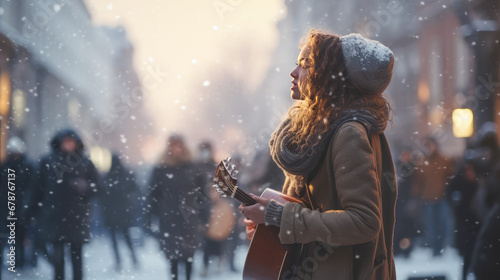 Young girl guitarist perform on a winter snowy street. Woman singing and playing guitar  street musicians  performance. 