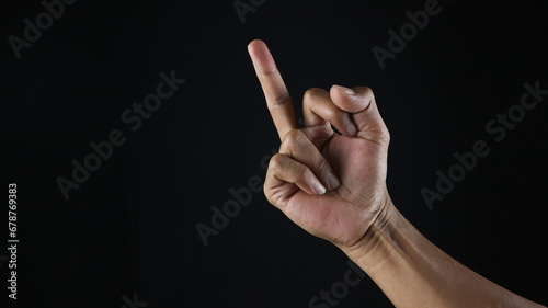 Human Hand Gesturing With Middle Finger On White Background