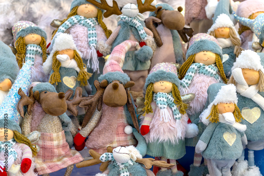 Fabulous Scandinavian Christmas characters on store counter. Soft toys. Christmas girls