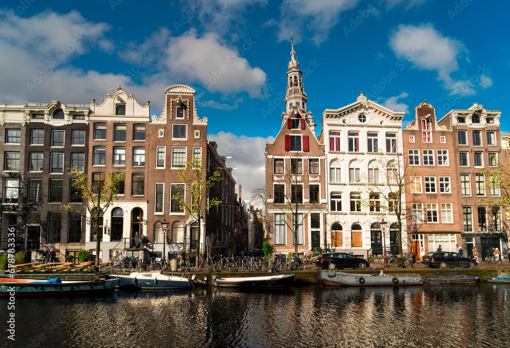 Facades of old Houses over canal water, Amsterdam, Netherlands