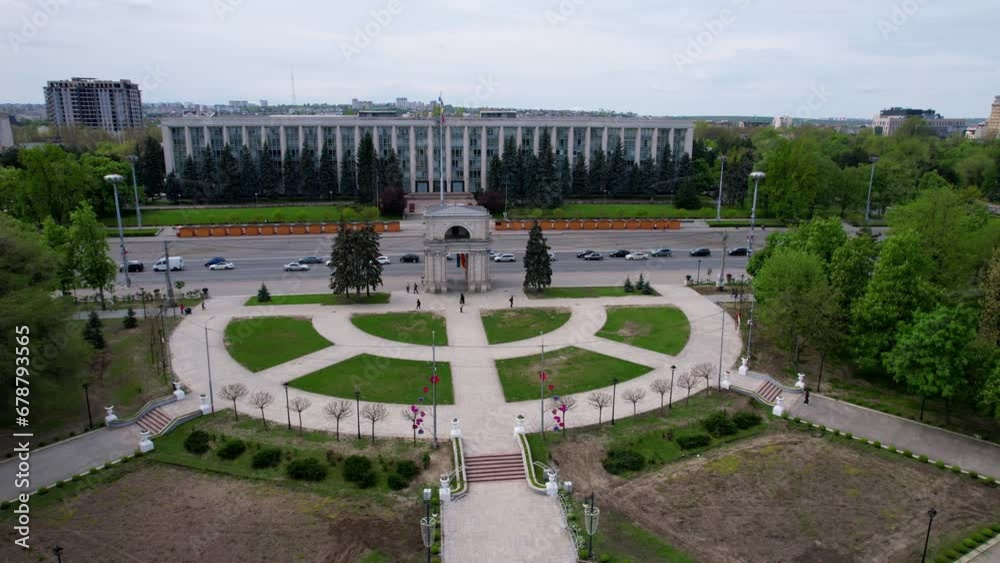 Panoramic aerial drone view of Triumphal Arch, Great National Assembly Square with Government Building of Republic of Moldova on background in Boulevard Stefan cel Mare of Chisinau, Moldova. 4K video. Panoramic aerial drone view of Triumphal Arch, Great National Assembly Square with Government Building of Republic of Moldova on background in Boulevard Stefan cel Mare of Chisinau, Moldova. 4K video.