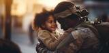 Patriotic African American soldier shares an emotional hug with his daughter after returning home from serving his country
