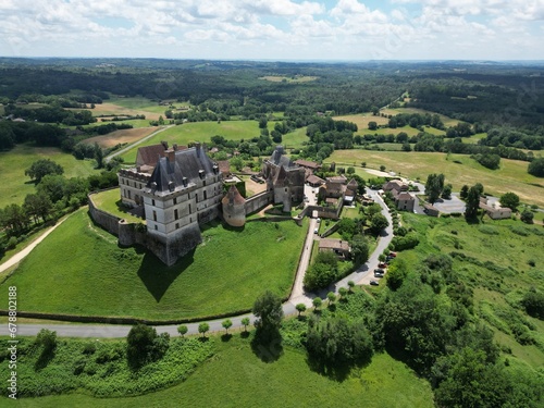 Biron castle Chateau Dordogne France aerial high angle.. photo