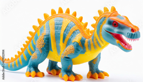 a plastic toy dinosaur isolated on a white background