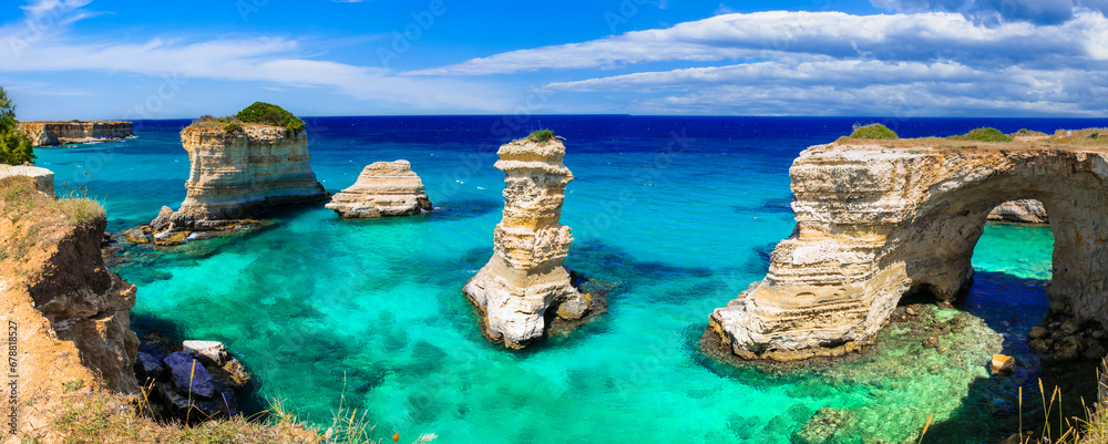 Italian summer holidays. Wonderful sea scenery in Puglia. "Torre di Sant Andrea" - famous rock formations near Otranto and popular beach. Italy. - obrazy, fototapety, plakaty 