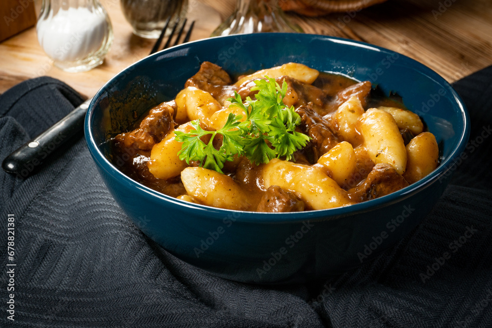 Beef stew in gravy.