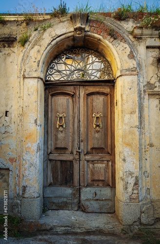 Ancient portal of an abandoned house