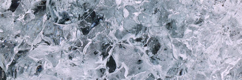 Abstract structure of a transparent block of ice. Graphic, monochrome background.