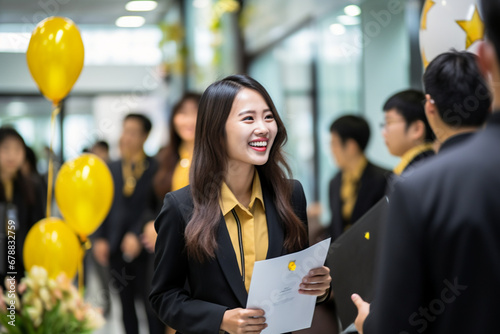 Young Asian female employee receiving recognition award from senior colleague. Proud employee in office celebration ceremony, achievement and success concept