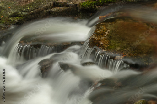 Ponikly creek with flood water after night rain in autumn morning photo