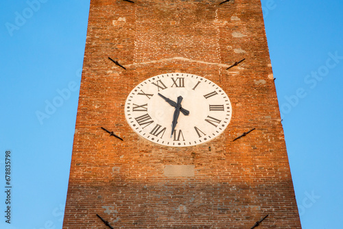 View of the clock tower in Lucca, Tuscany, Italy.