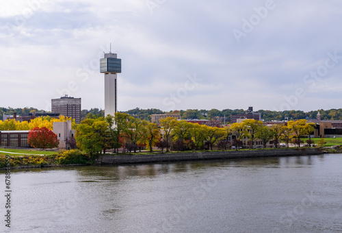 Panorama of downtown Moline in Illinois seen from the I-74 interstate bridge along Mississippi River photo