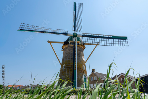 The mill called KorenMolen 1722 is located on the Molenweg in Zoutelande, Zeeland photo
