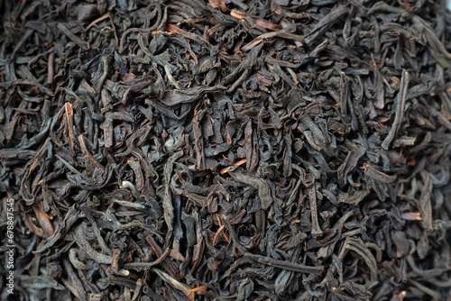 Close-up of red tea leaves from China. Macro photo, top view, flat lay. Tea drinking tradition, food background