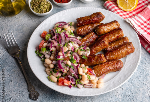 Obraz na płótnie Turkish Tekirdag or inegol Kofte with Piyaz Salad w salonie