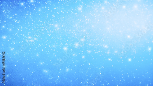 Abstract  blue winter background with white glowing dots scattered throughout the image and bokeh effect. Dreamy and ethereal feel.
