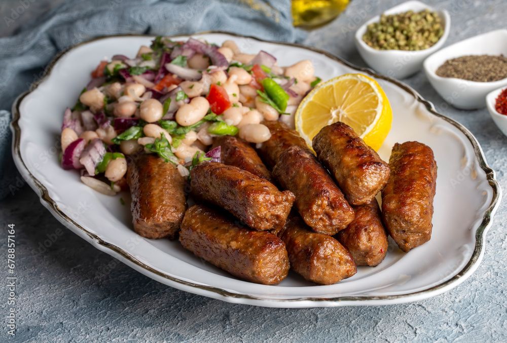 Turkish Tekirdag or inegol Kofte with Piyaz Salad Turkish Tekirdag or inegol Kofte with Piyaz Salad