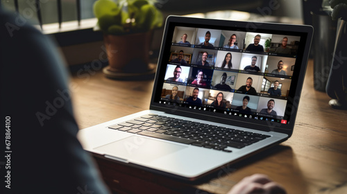 Man Working From Home Having Online Group Video meeting On Laptop photo