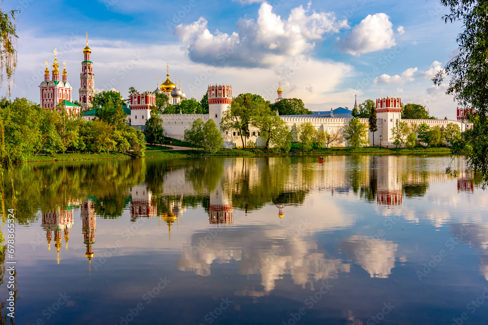 Novodevichy Convent (New maiden's monastery) reflected in pond, Moscow, Russia